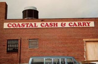 coastal cash and carry sign