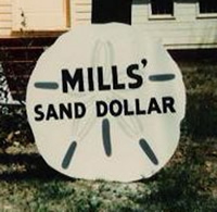 Mills’ Sand Dollar sign