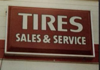 tire sales and service sign