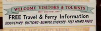 travel and ferry information sign