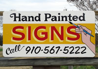 hand painted signs sign