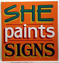 she paints signs