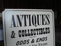 detail of antiques sign
