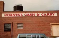 coastal cash and carry sign