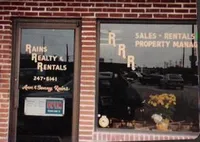 Rains Realty Rentals door lettering