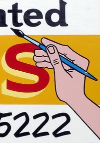 detail of hand and brush