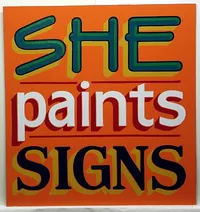 she paints signs